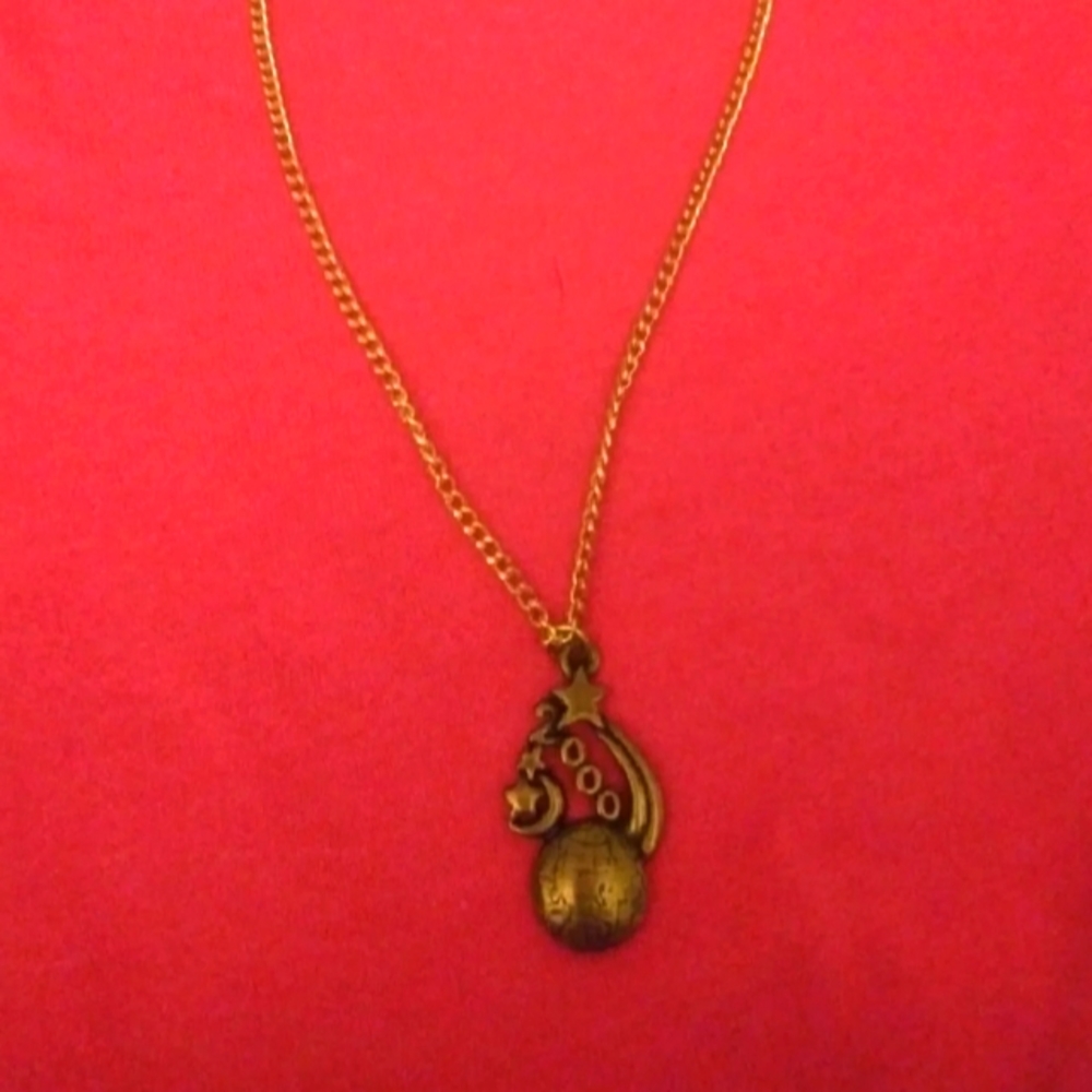 J391 Moon and Stars Goldtone Necklace